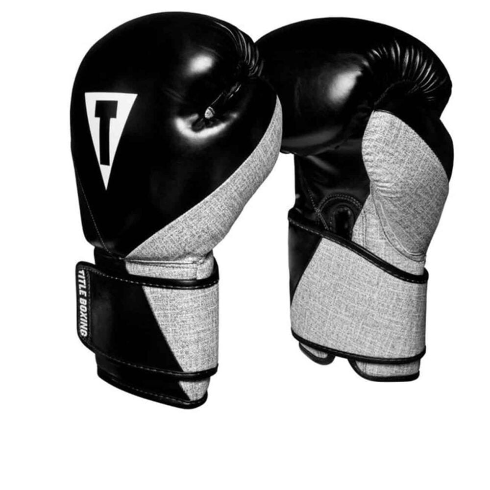 Boxningshandskar i svart konstläder med detaljer i grått. Kardborrelåsning och stoppning som ger bra komfort